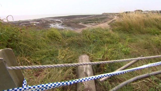 Police tape on the cliff top
