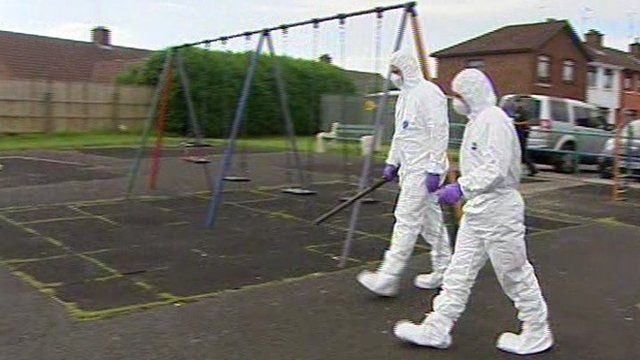 Forensic scientists at shooting scene