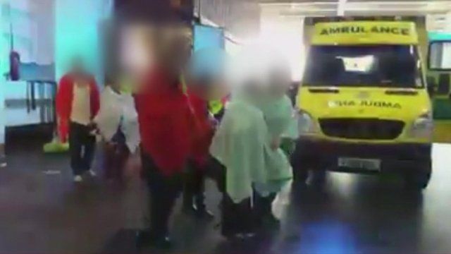 Still from video footage showing the moment the stowaways emerged from the container