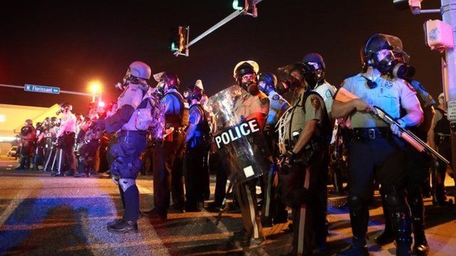 Police stand guard in Ferguson