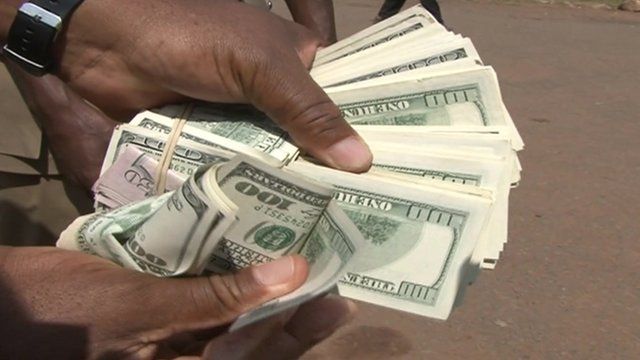 A handful of dollar bills