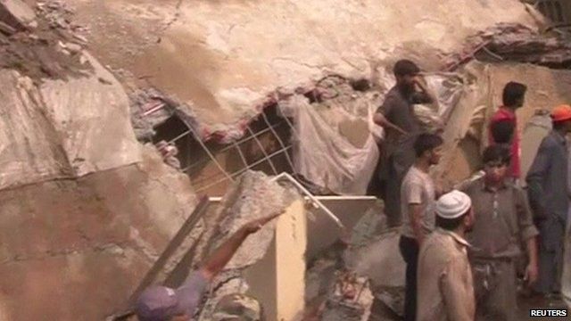 Rescue workers at site of collapsed mosque
