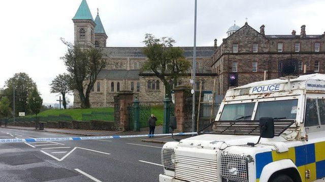 The device was thrown at a police patrol on the Crumlin Road