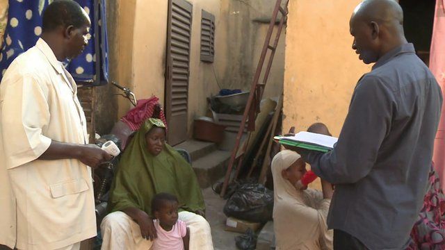 Health workers assessing quarantined patients