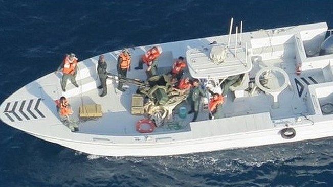 Pentagon-supplied picture purporting to show an Iranian Revolutionary Guards Corps Navy vessel whose crew removed an unexploded limpet mine from a Japanese tanker, 17 June 2019
