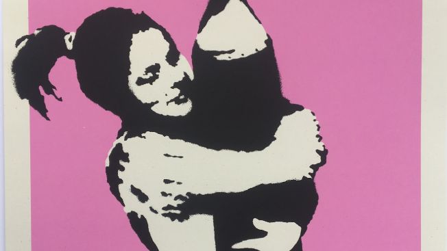 A picture of the print of the 2003 Banksy work Bomb Love. 