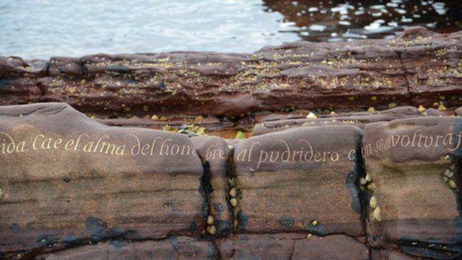 Pablo Neruda poem carved into rock