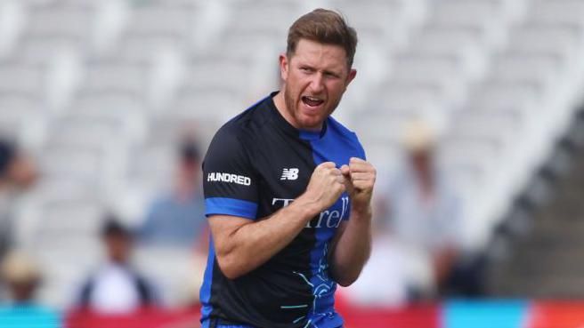 Liam Dawson celebrates a wicket