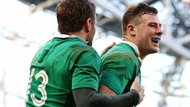 Robbie Henshaw of Ireland is congratulated by teammate Jared Payn