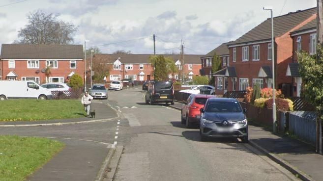 Houses and cars in Seven Stars Road