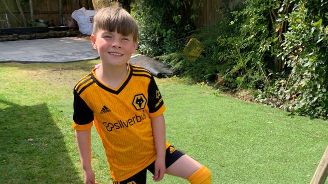 Oscar in his Wolves kit