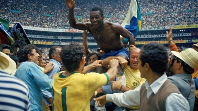 Pele on supporters' shoulder after Brazil's 4-1 victory over Italy in the final of the 1970 Fifa World Cup