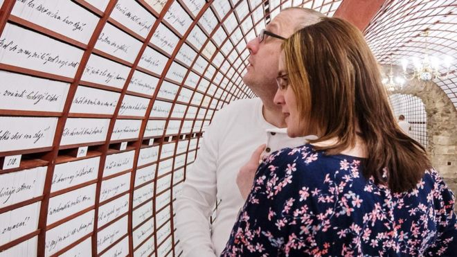 A couple in Banska Stiavnica 'love bank'