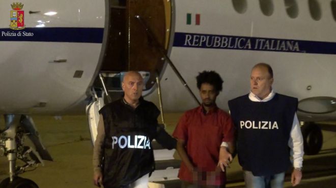 A police photo shows Mered Medhanie arriving on Italian soil (8 June)