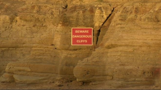 Предупреждающий знак на скалах