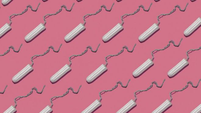 tampons on pink background
