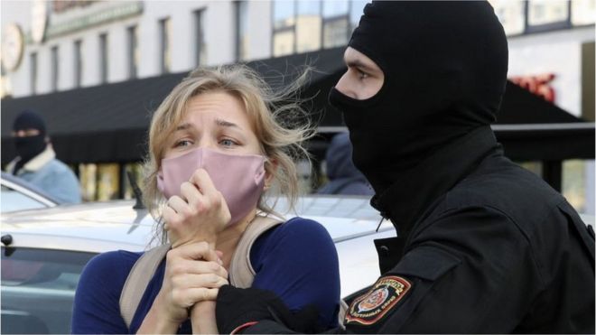 Woman protester being arrested in Minsk, 19 Sep 20