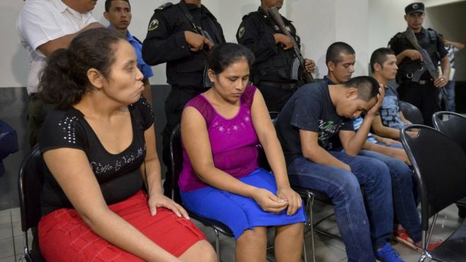 Pastor Juan Rocha (with head in hands) and his four followers were tried in the town of Managua