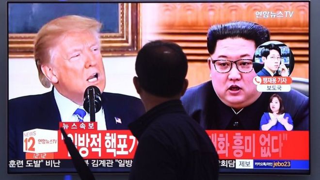 South Korean TV screen shows images of Donald Trump and Kim Jong-un side by side