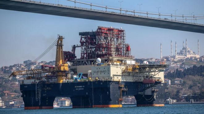 An oil platform ship flagged Bahana Islands passes through the Bosphorus and July 15 Martyrs' Bridge in Istanbul, Turkey.