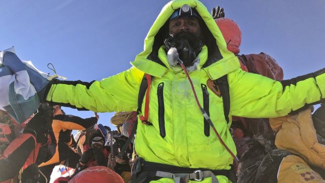 Kuntal Joisher stands atop the world's highest peak
