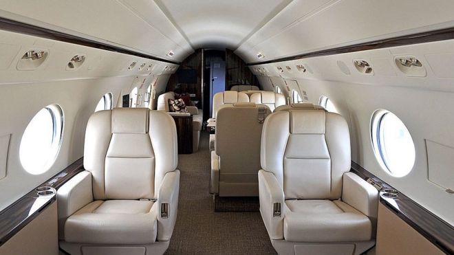 The interior of a private jet.