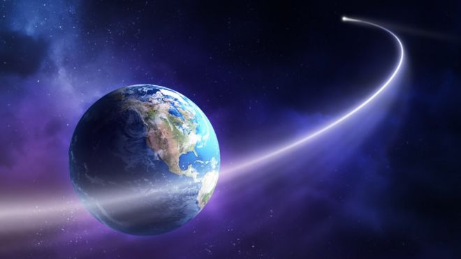 Ilustración de un cometa pasando cerca de la Tierra