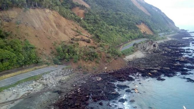 A handout photo taken and received on 14 November 2016, show earthquake damage to State Highway One near Ohau Point on the South Island"s east coast.