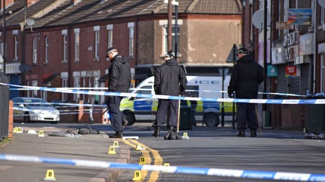 Police officers searching for evidence in Chandos Street, Coventry, after the death of a 16-year-old boy following a stabbing