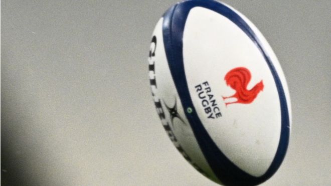 A rugby ball that says France Rugby on it