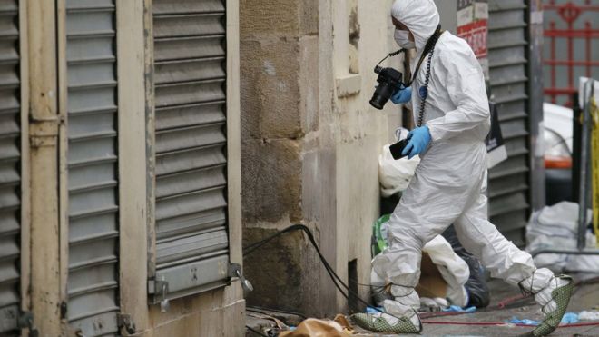A forensics expert at the flat in Saint- Denis, 19 November