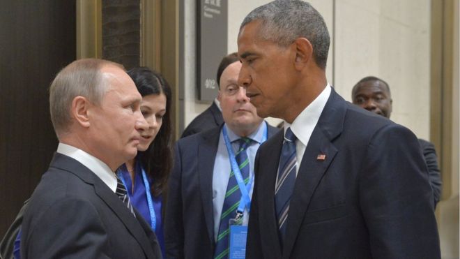 Президент России Владимир Путин (слева) беседует с США.Президент Барак Обама
