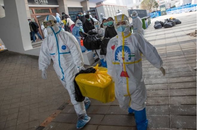 Medical staff clean up the empty hospital after all patients were discharged at Wuchang Fangcang hospital, a temporary hospital set up at Hongshan gymnasium to treat people infected with the coronavirus and Covin-19 disease, in Wuhan, Hubei Province, China, 10 March 2020 (issued 11 March 2020)