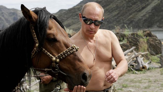 Topless Putin feeding a horse in Siberia