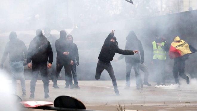 Protesters in Brussels march against the UN migration pact
