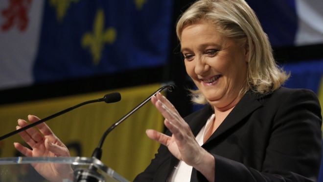 Marine Le Pen, leader of the French National Front, waves to supporters. 6 Dec 2015