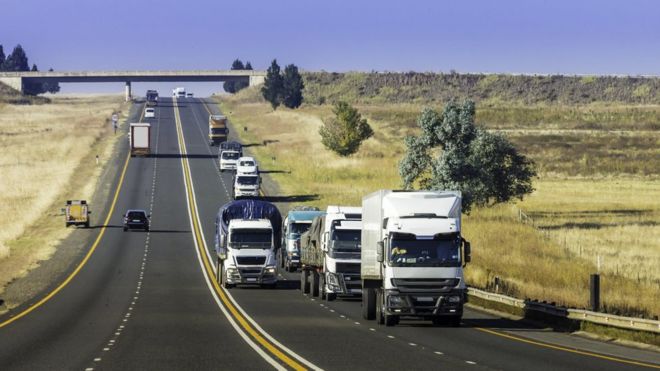 Trucks driving on a road in South Africa