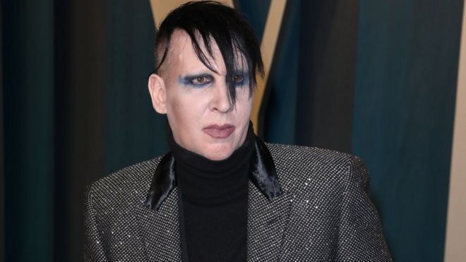 Marilyn Manson fined for blowing nose on concert camerawoman - BBC