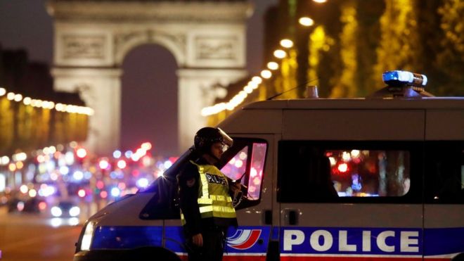 Police secure the Champs Elysee Avenue after one policeman was killed and another wounded in a shooting incident in Paris, France, 20 April