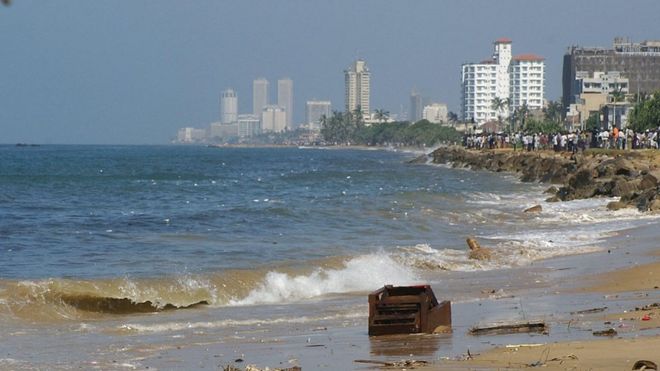 COLOMBO, SRI LANKA: The sea front of Colombo is seen in this picture taken 26 December 2004 as tidal waves, caused by an earthquake off Indonesia, smashed into more than half of Sri Lanka's coastline. The tsunami tidal waves weakened as it hit the capital, but elsewhere at least 324 people were killed and hundreds were missing. AFP PHOTO Sena VIDANAGAMA (Photo credit should read SENA VIDANAGAMA/AFP/Getty Images)