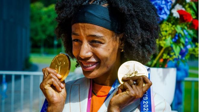 Ethiopian-born Dutch athlete Sifan Hassan with her two gold medals from the Tokyo Olympics