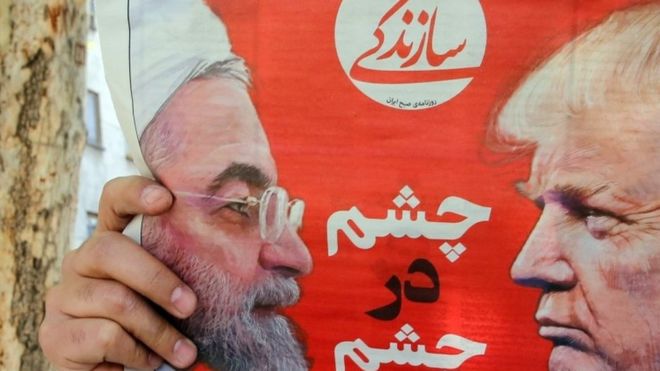 Presidents Rouhani and Trump on a newspaper in Tehran