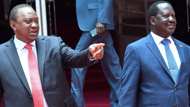 Kenya"s President Uhuru Kenyatta (left) gestures as National Super Alliance (NASA) coalition opposition leader Raila Odinga looks on