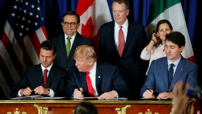 Президент США Дональд Трамп, президент Мексики Энрике Пена Ньето и премьер-министр Канады Джастин Трюдо присутствуют на церемонии подписания USMCA