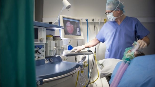 Anaesthetist with a patient