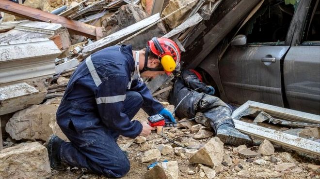This handout photo released by BMPM/SM shows firemen working and removing rubble at the site where two buildings collapsed, on November 5, 2018 in Marseille