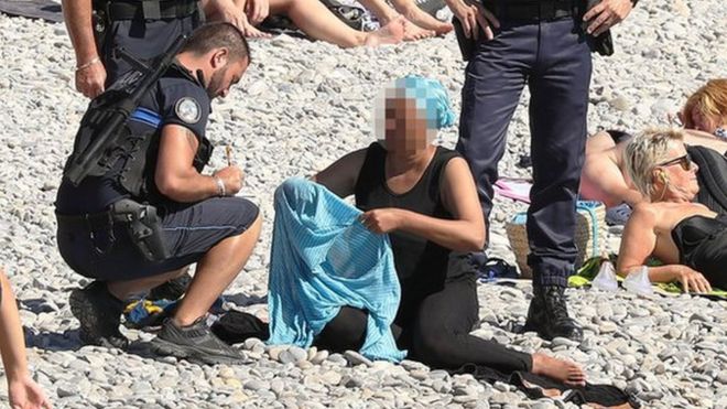 Police patrolling in Nice fine a woman for wearing a burkini