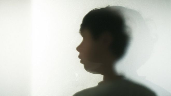 Stock image of a child in silhouette