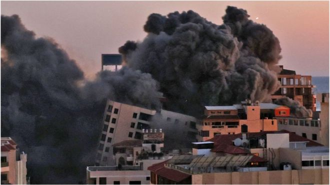 Tower block collapses in Gaza, 11 May