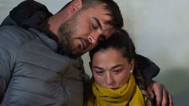 Parents of two-year-old Julen Rosello hug in Totalan, southern Spain, on January 24, 2019